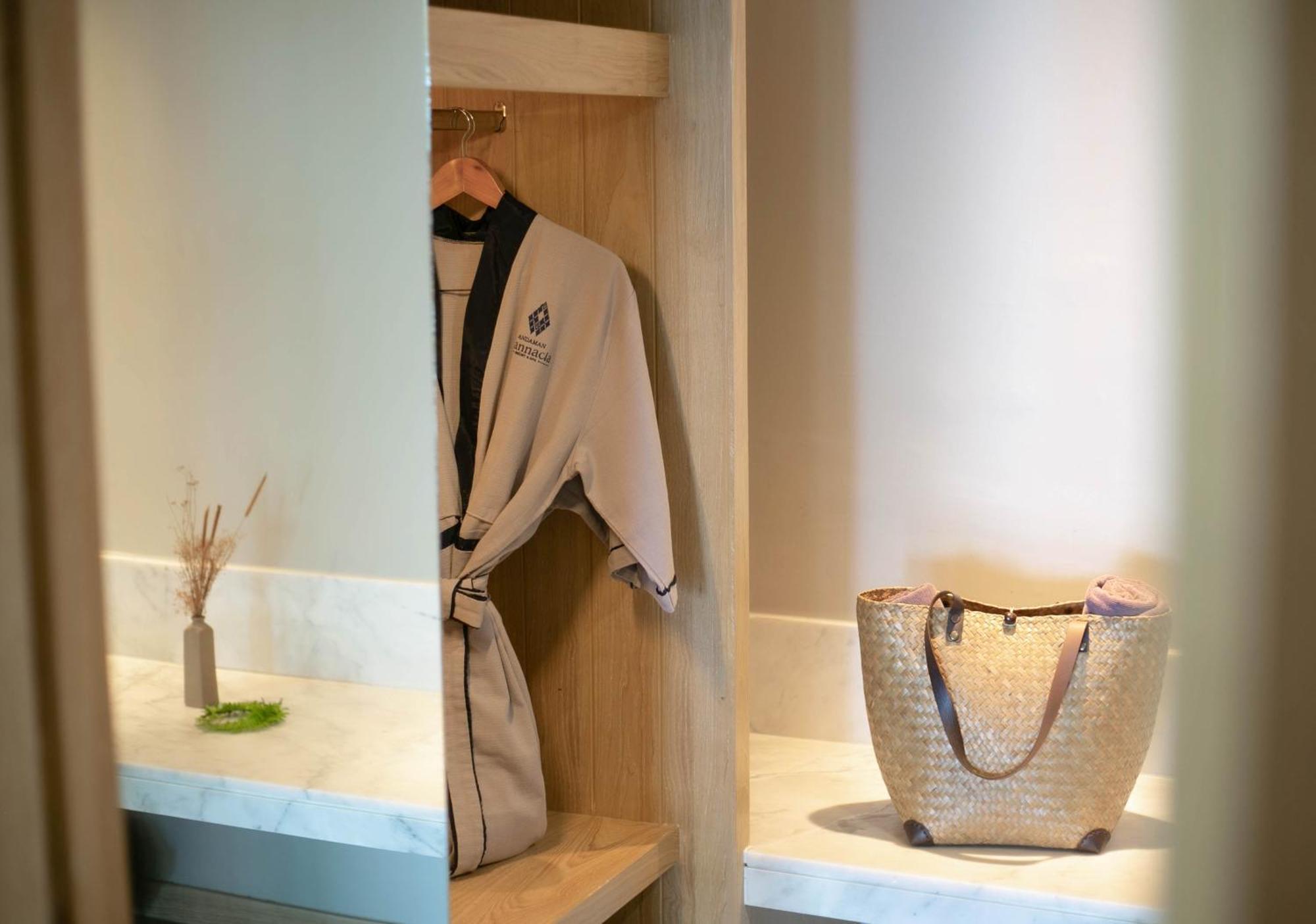 Andaman Cannacia Resort & Spa - Sha Extra Plus Kata Beach  Exterior photo A bathrobe hanging in a closet